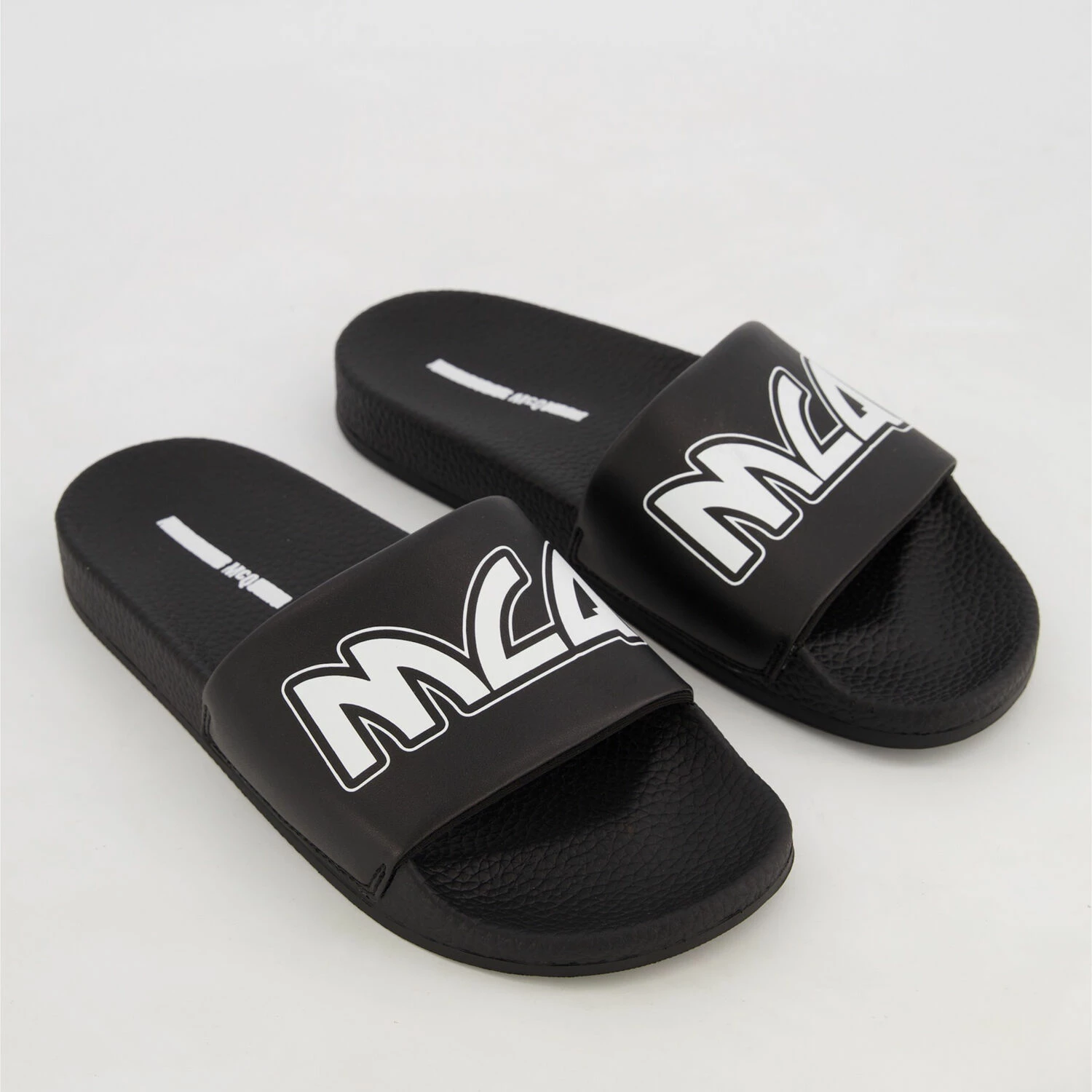 MCQ Black & White Logo Sliders